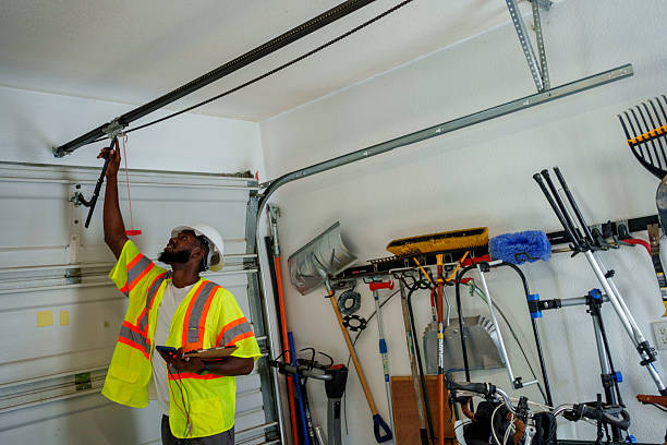 Professional Garage Door Roller Replacement technician working in Charleston, MS